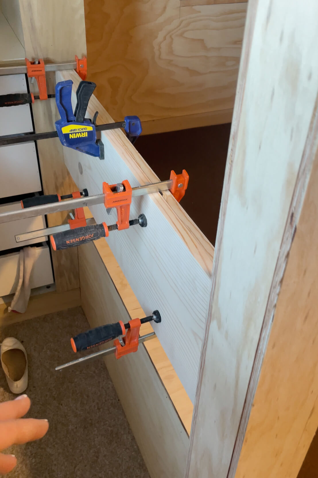 Adding safety railing to a DIY bunk bed.